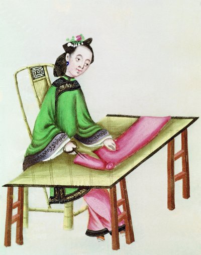 A Chinese Woman cutting cloth, Qianlong Period (1736-96) by Chinese School
